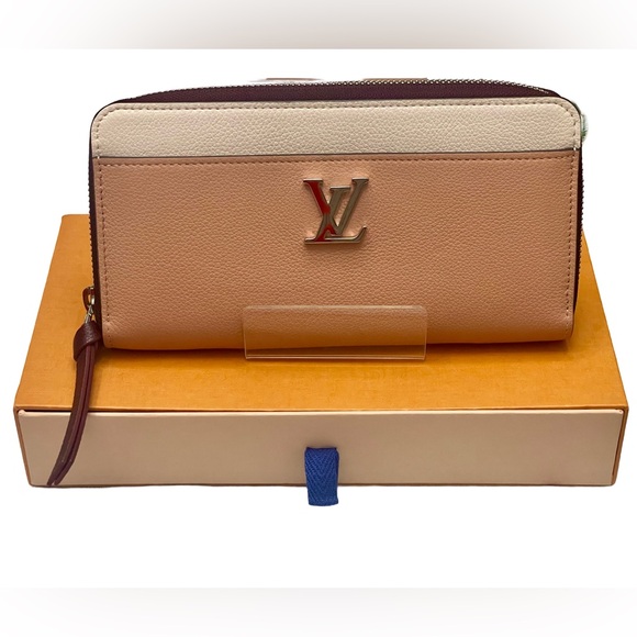 LOUIS VUITTON Zippy Lock Me Leather Wallet - Picture 2 of 14